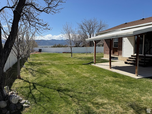 350 S 50 W, Ephraim, UT 84627 - view of yard with a fenced backyard, a mountain view, and a patio
