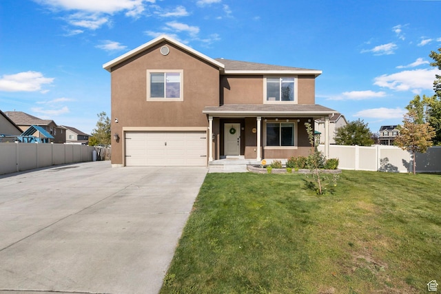 5943 N Bleeker, Stansbury Park, UT 84074 - traditional-style house with a garage, driveway, and stucco siding