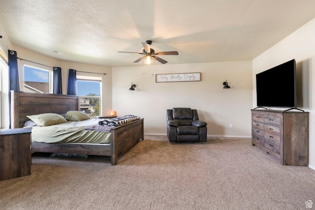 5943 N Bleeker, Stansbury Park, UT 84074 - bedroom with carpet, a textured ceiling, and ceiling fan