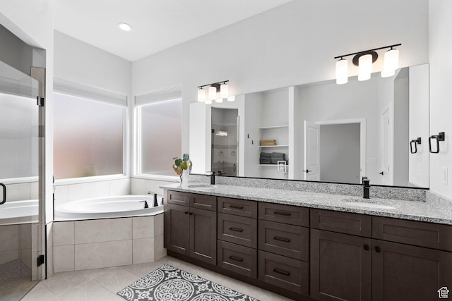 6059 S Bunda Way, St George, UT 84790 - bathroom with tile patterned flooring, a garden tub, a stall shower, and a sink