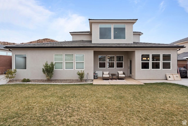 6059 S Bunda Way, St George, UT 84790 - back of property with a yard, stucco siding, and a patio