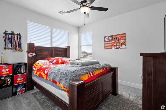 6059 S Bunda Way, St George, UT 84790 - carpeted bedroom with a ceiling fan, baseboards, and visible vents