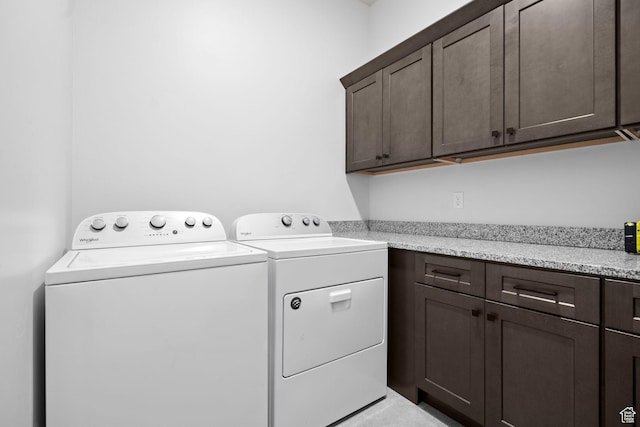 6059 S Bunda Way, St George, UT 84790 - laundry room with washing machine and dryer and cabinet space