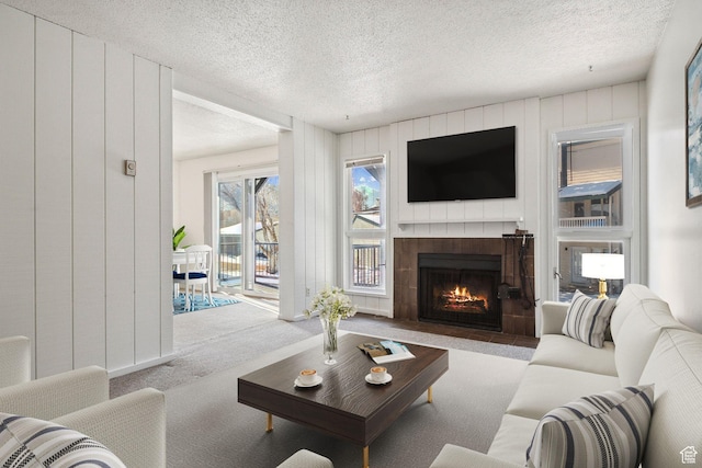 1900 Homestake Rd Unit 32, Park City, UT 84060 - living area with carpet floors, a textured ceiling, and a fireplace
