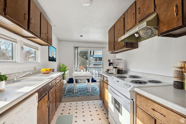 1900 Homestake Rd Unit 32, Park City, UT 84060 - kitchen featuring white appliances, under cabinet range hood, light countertops, light flooring, and a sink