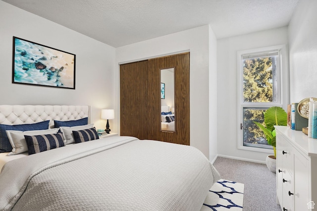 1900 Homestake Rd Unit 32, Park City, UT 84060 - bedroom featuring light carpet, baseboards, and a textured ceiling