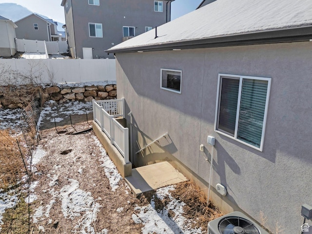 1186 N Buckboard Ln, Spanish Fork, UT 84660 - view of side of property with fence, cooling unit, and stucco siding