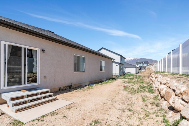 1186 N Buckboard Ln, Spanish Fork, UT 84660 - view of side of home with a residential view and stucco siding