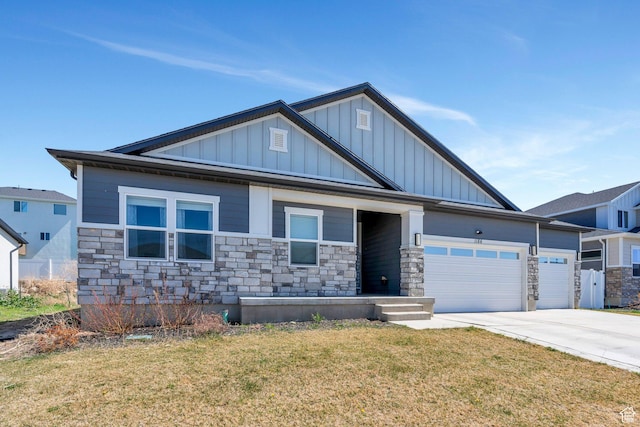 1186 N Buckboard Ln, Spanish Fork, UT 84660 - craftsman house with concrete driveway, board and batten siding, a garage, and stone siding