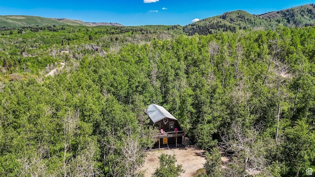 2821 S Deer Run Rd Unit 1011C, Heber City, UT 84032 - aerial view of property and surrounding area with a forest and a mountainous background