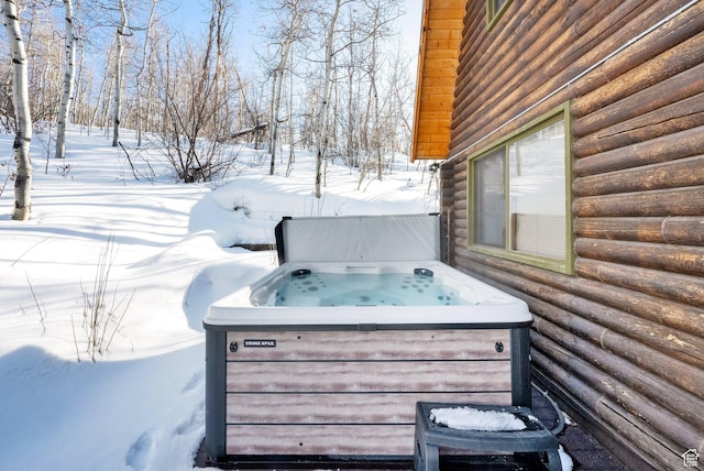 2821 S Deer Run Rd Unit 1011C, Heber City, UT 84032 - snow covered deck featuring a hot tub