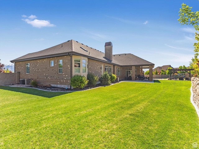 14738 S Currant Creek Cir W, Bluffdale, UT 84065 - rear view of house with a patio area, brick siding, a chimney, cooling unit, and a pergola