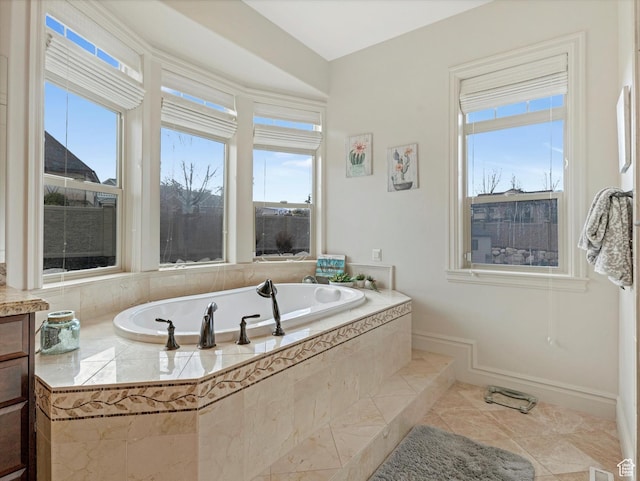 14738 S Currant Creek Cir W, Bluffdale, UT 84065 - full bath featuring plenty of natural light, a garden tub, tile patterned flooring, and baseboards
