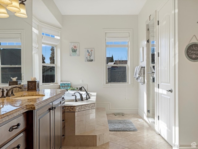 14738 S Currant Creek Cir W, Bluffdale, UT 84065 - bathroom featuring vanity, a bath, and tile patterned flooring
