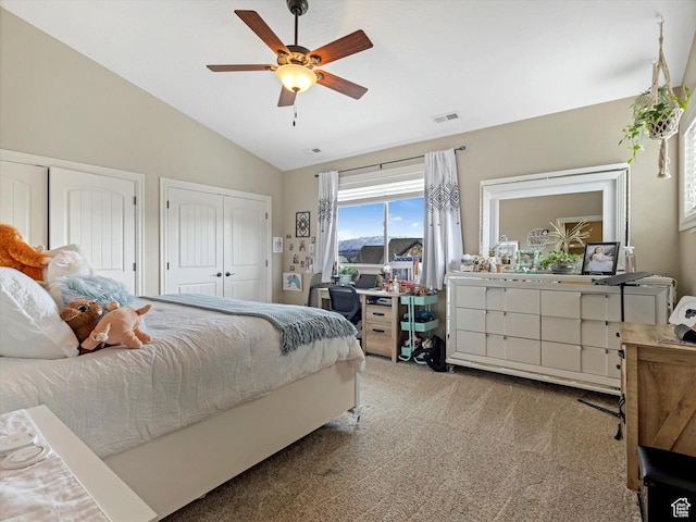 14738 S Currant Creek Cir W, Bluffdale, UT 84065 - carpeted bedroom with vaulted ceiling, two closets, a desk, and a ceiling fan