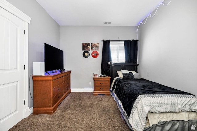 bedroom featuring visible vents, baseboards, and carpet floors
