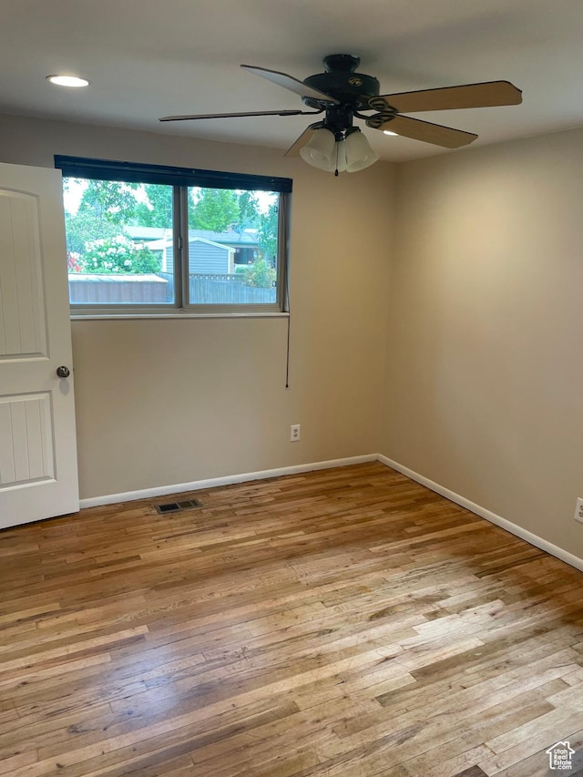 344 E Wilford Ave, Murray, UT 84107 - spare room with healthy amount of natural light, ceiling fan, wood finished floors, and recessed lighting