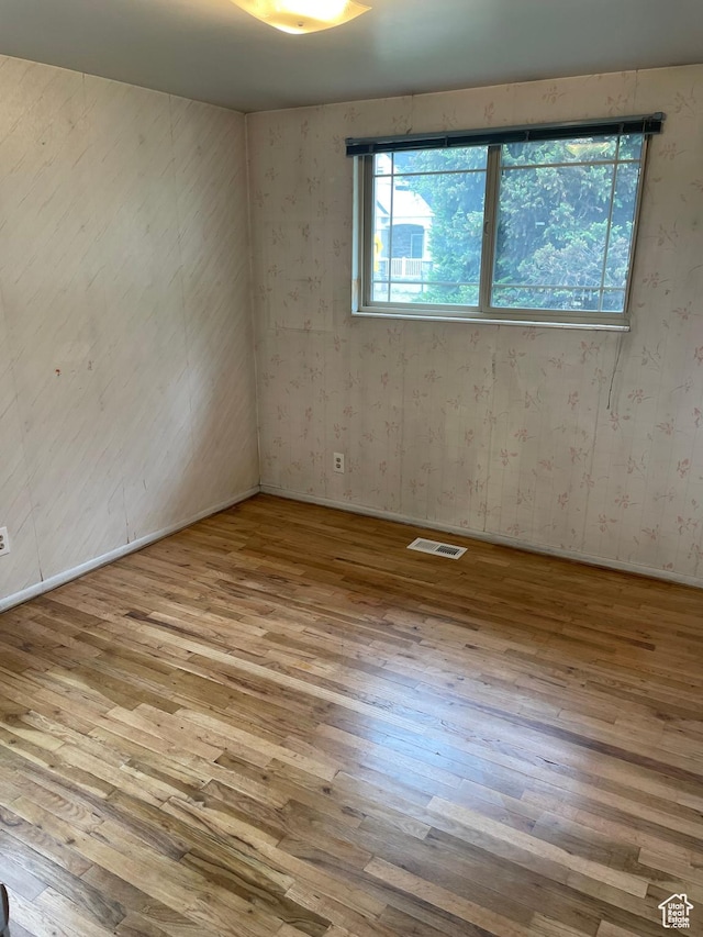 344 E Wilford Ave, Murray, UT 84107 - unfurnished room with hardwood / wood-style flooring and baseboards