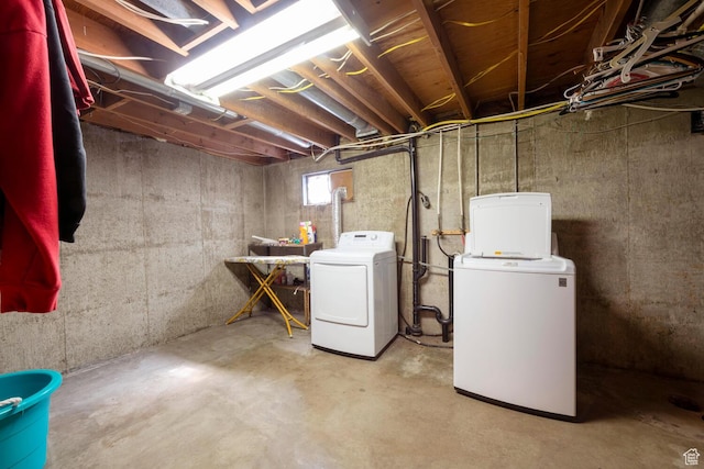 below grade area with washer and clothes dryer