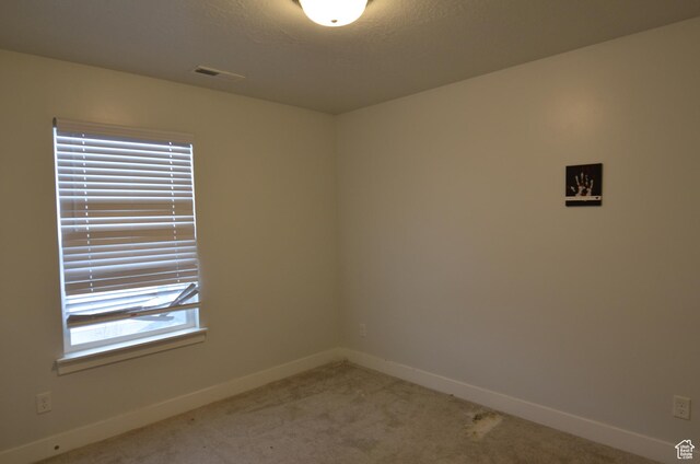5289 W Van Dyne Ln, Herriman, UT 84096 - spare room with visible vents, light colored carpet, and baseboards