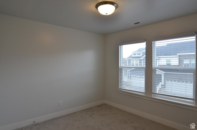 5289 W Van Dyne Ln, Herriman, UT 84096 - spare room with visible vents, baseboards, and light carpet