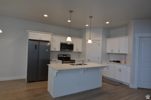 5289 W Van Dyne Ln, Herriman, UT 84096 - kitchen featuring white cabinetry, dark wood-style floors, appliances with stainless steel finishes, and a sink
