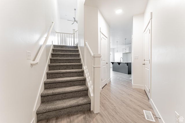 642 W 4500 S Unit 322, Mapleton, UT 84664 - staircase with wood finished floors and a ceiling fan