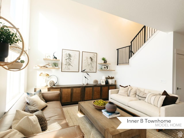 living room with a towering ceiling