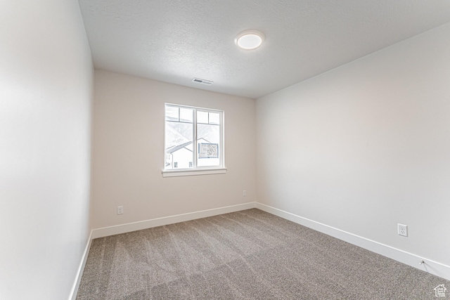624 W 4500 S Unit 325, Mapleton, UT 84664 - carpeted empty room with a textured ceiling and baseboards