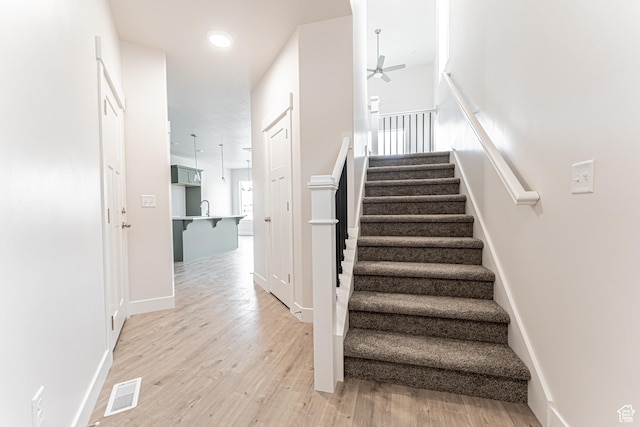 624 W 4500 S Unit 325, Mapleton, UT 84664 - stairs featuring a ceiling fan and wood finished floors