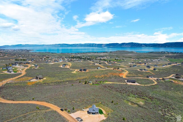 3278 S Serviceberry Dr Unit 18, Garden City, UT 84028 - drone / aerial view of a water and mountain view