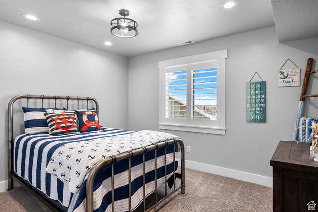 3278 S Serviceberry Dr Unit 18, Garden City, UT 84028 - carpeted bedroom featuring baseboards and recessed lighting