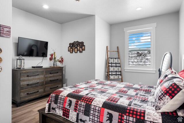 3278 S Serviceberry Dr Unit 18, Garden City, UT 84028 - bedroom featuring wood finished floors and recessed lighting