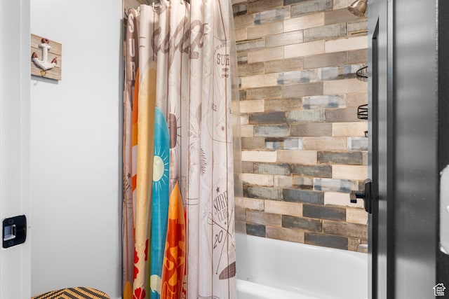 3278 S Serviceberry Dr Unit 18, Garden City, UT 84028 - bathroom featuring shower / bath combo with shower curtain