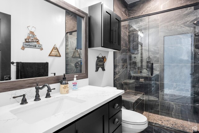 3278 S Serviceberry Dr Unit 18, Garden City, UT 84028 - full bath featuring toilet, vanity, and a shower stall