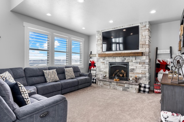 3278 S Serviceberry Dr Unit 18, Garden City, UT 84028 - living area featuring carpet flooring, a stone fireplace, and recessed lighting