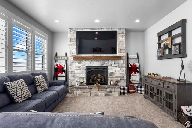 3278 S Serviceberry Dr Unit 18, Garden City, UT 84028 - carpeted living room featuring a fireplace and recessed lighting