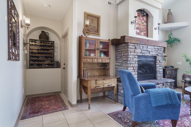 1015 S Westview Dr, Cedar City, UT 84720 - tiled living area with a fireplace and baseboards
