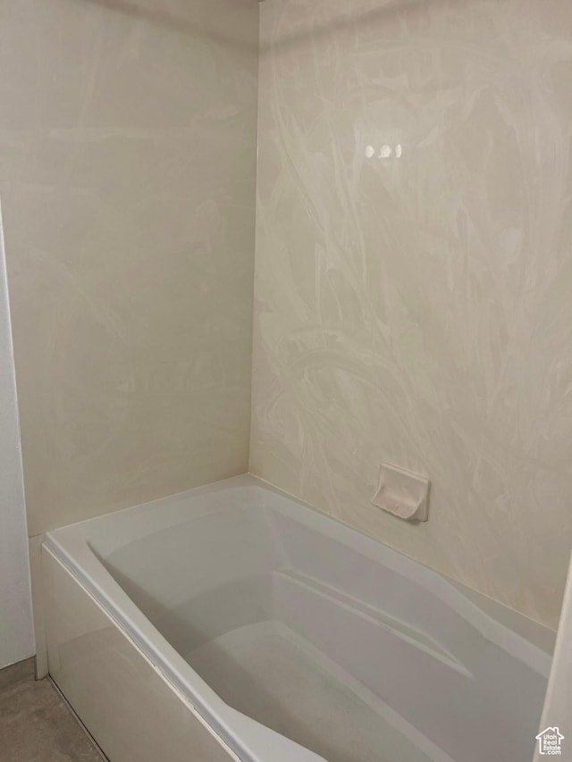 bathroom featuring a bath