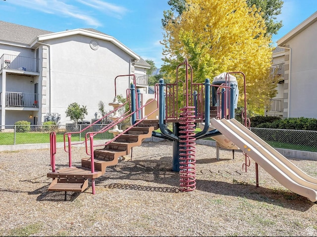 community play area featuring fence
