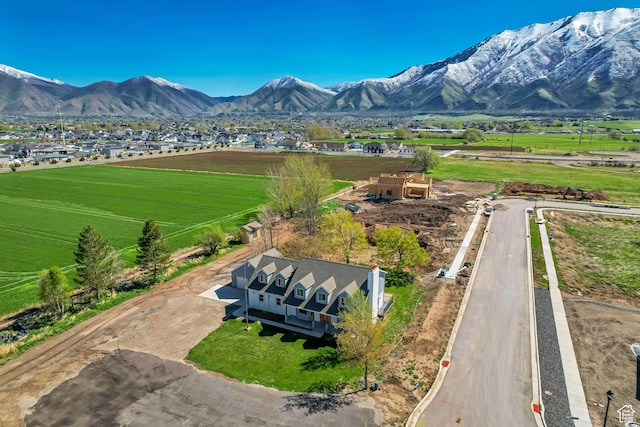 bird's eye view with a mountain view and a rural view