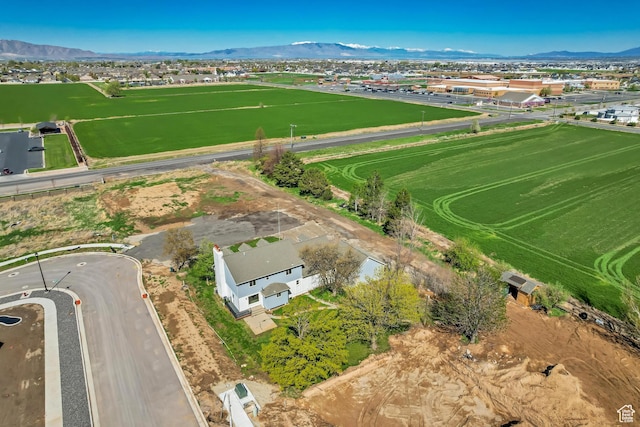bird's eye view featuring a residential view and a mountain view