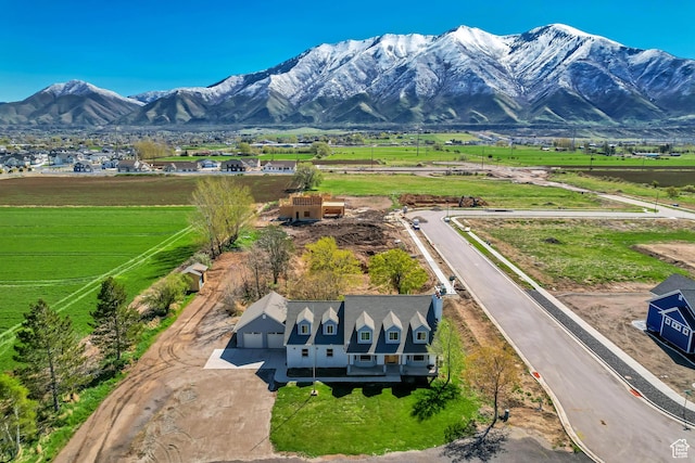 view of mountain feature with a rural view