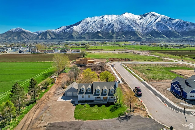 mountain view featuring a rural view
