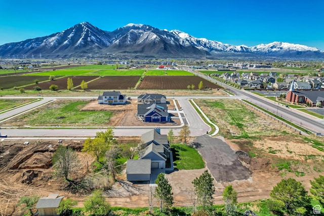 aerial view featuring a mountain view and a residential view