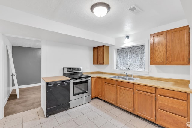kitchen with stainless steel electric range oven, dishwasher, light countertops, and a sink