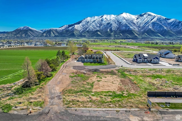 mountain view featuring a rural view