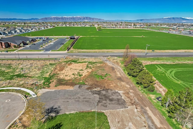 aerial view featuring a mountain view and a residential view