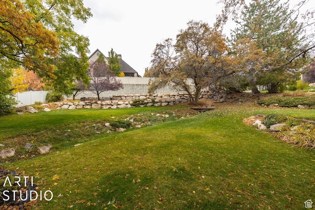 view of yard featuring fence