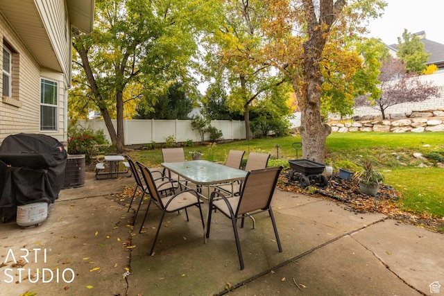 view of patio / terrace featuring central air condition unit, outdoor dining area, fence private yard, and grilling area